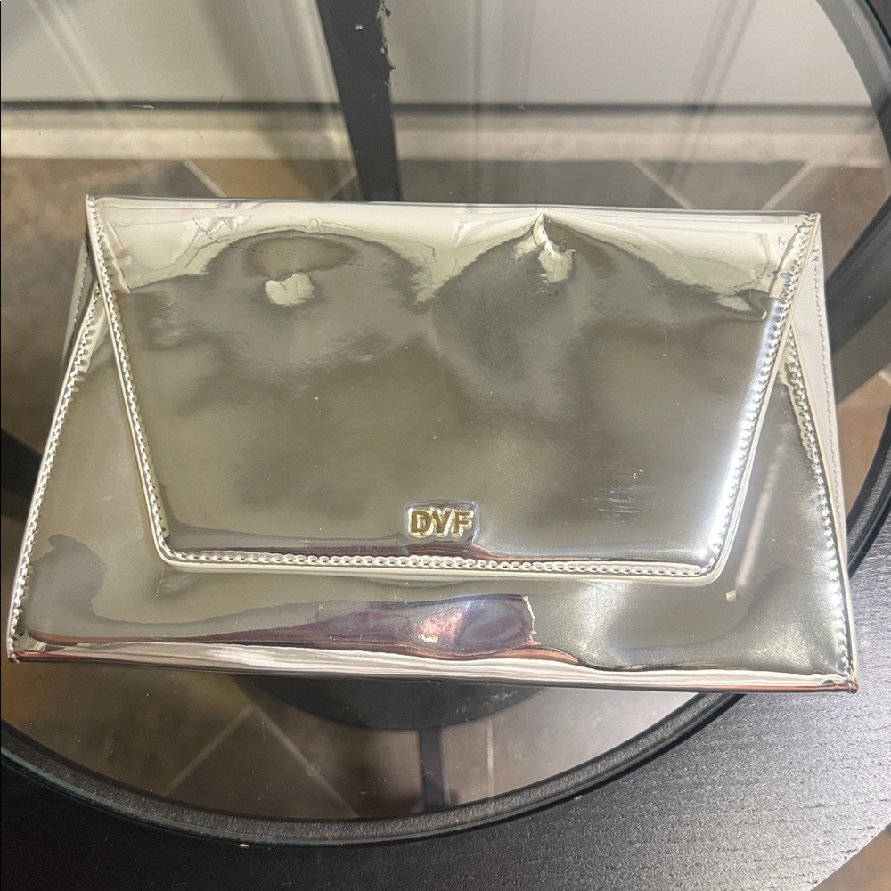 Diane Von Furstenberg silver up town clutch